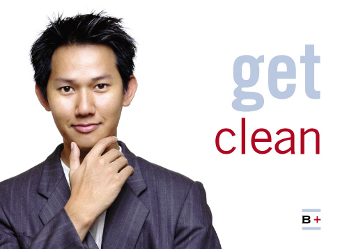 an east Asian man in a suit with his hand to his smooth-shaven chin, captioned 'get clean'